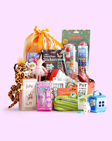 Untamed Post Stocking Stuffer Kit with holiday drawstring gift bag containing five age-appropriate, candy-free items for kids ages 3–11, custom selected by age and interests.