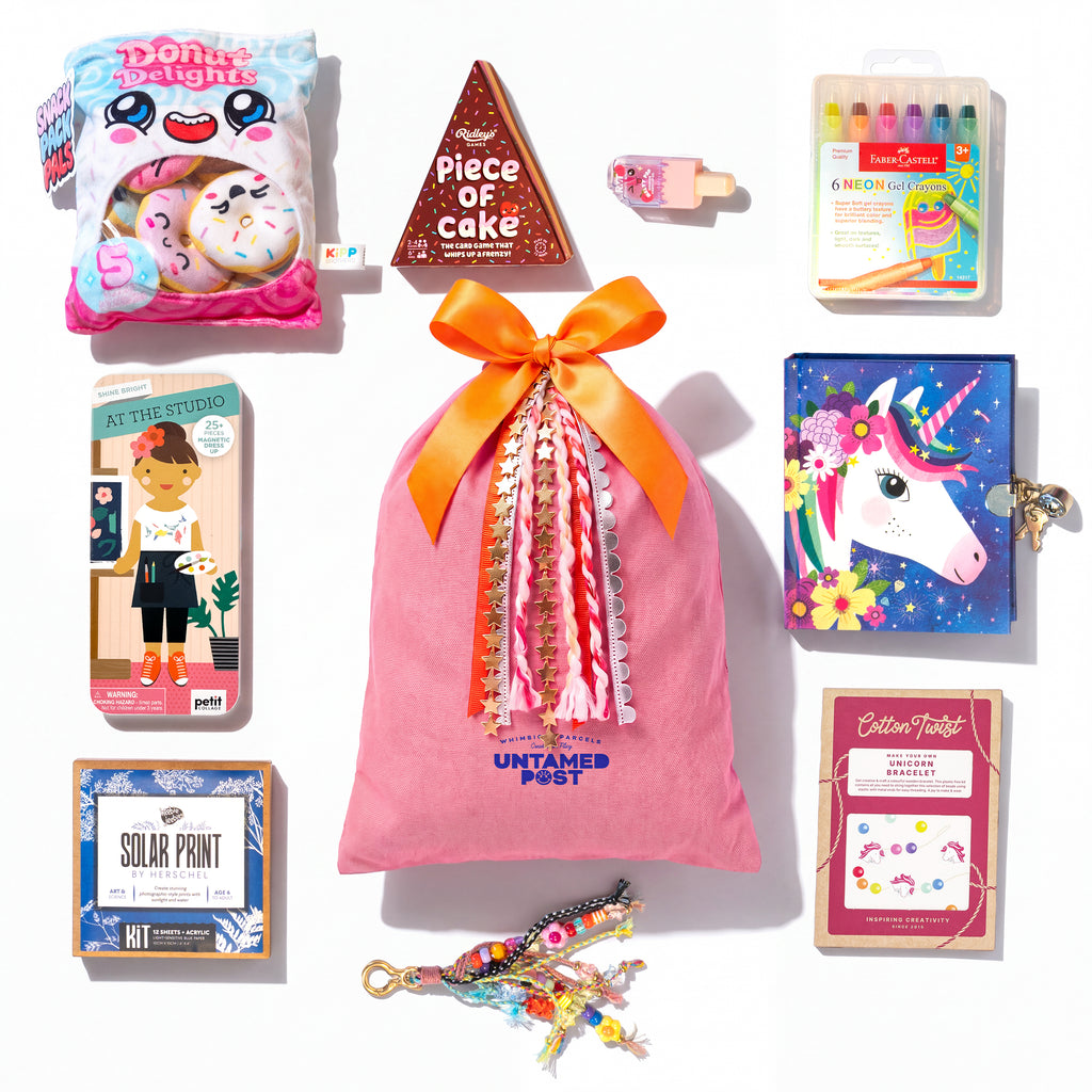 Untamed Post Stocking Stuffer Kit with five candy-free kids gifts in a limited-edition holiday drawstring bag